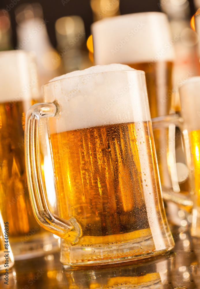 Jug of beer served on bar counter