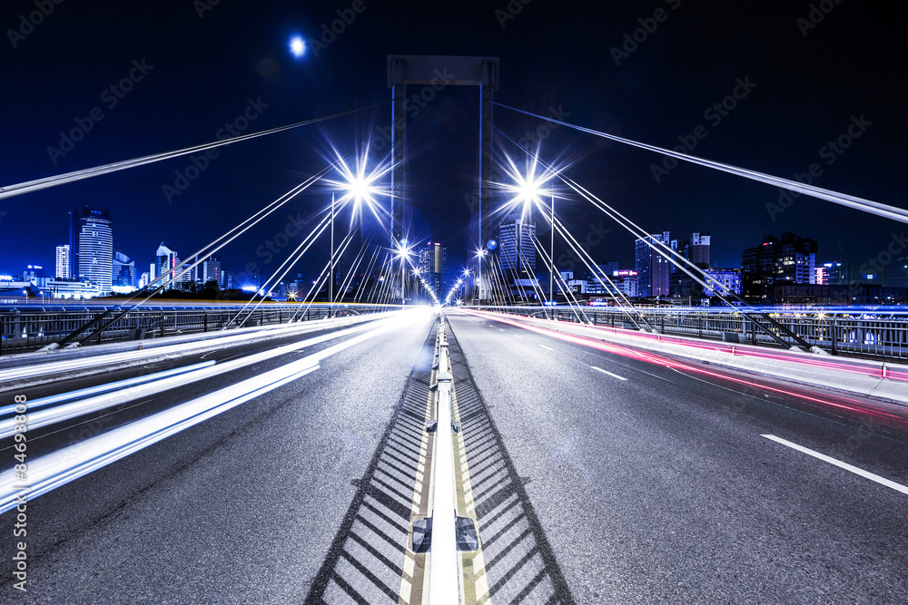 traffic light trail on bridge