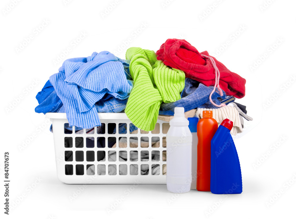 Clothes with detergent and in  plastic basket dropped isolated o