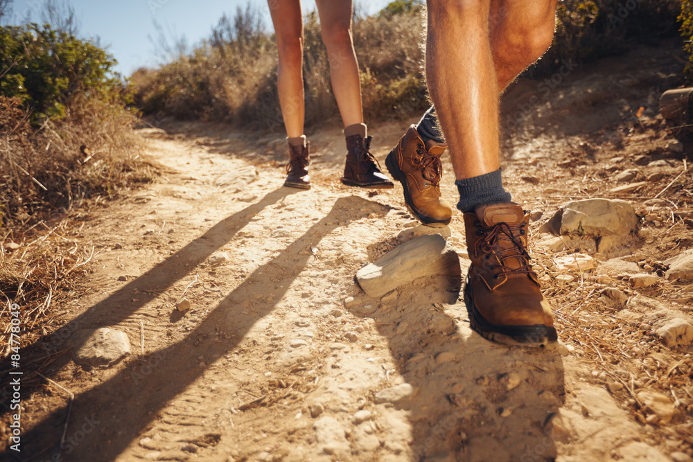 Hikers walking on the country path