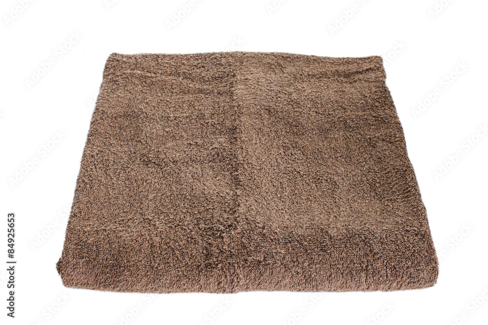 Brown body towel isolated on white background