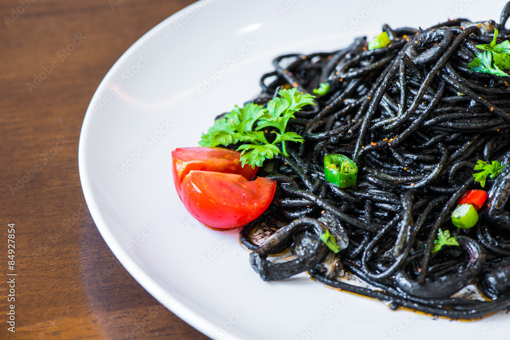 Pasta with squid ink and seafood