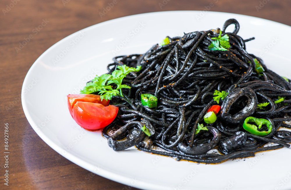 Pasta with squid ink and seafood