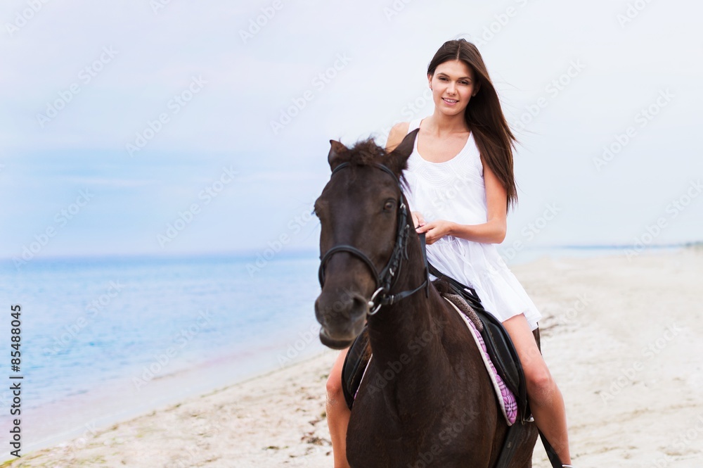 Beach, woman, horseback.