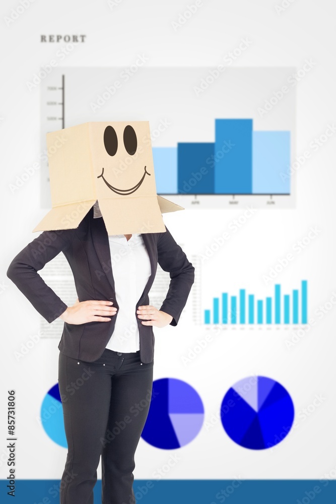 Composite image of businesswoman with box over head