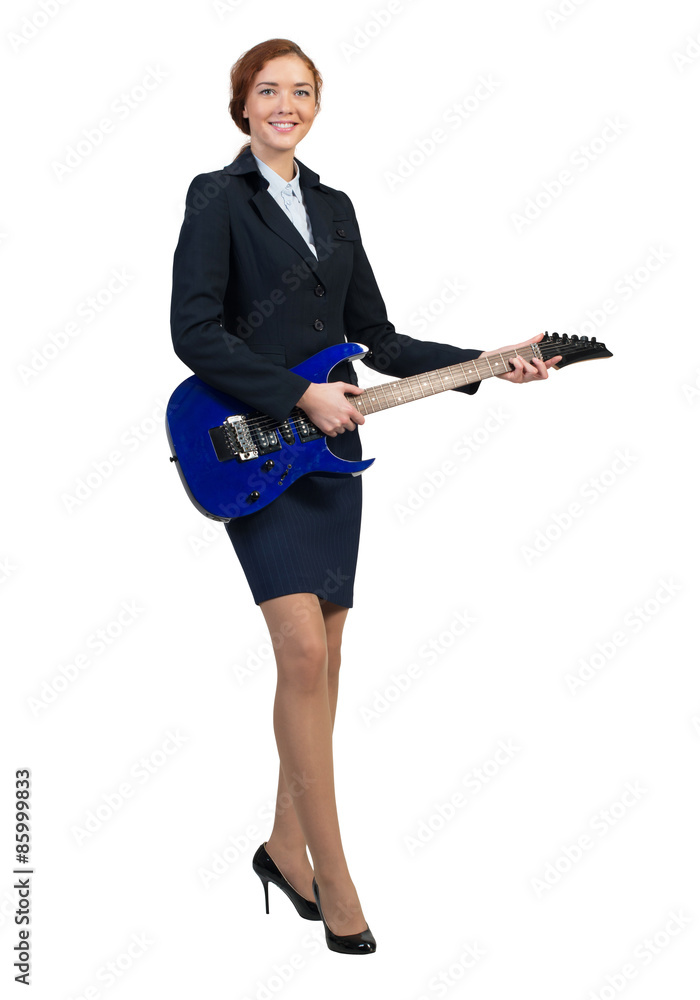 Businesswoman with guitar