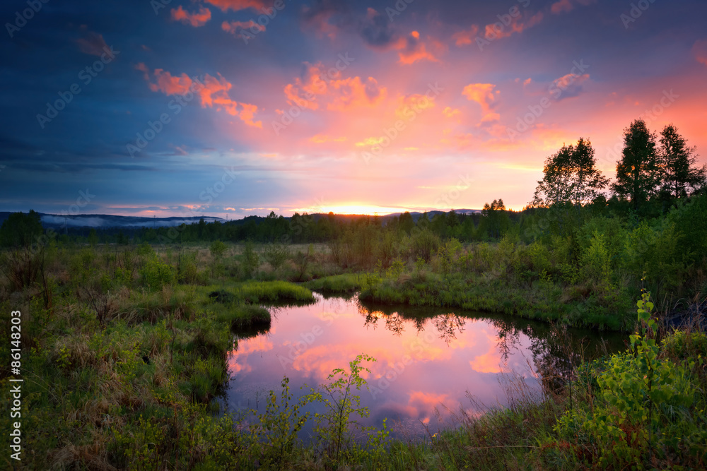 Sunrise reflection in a lake