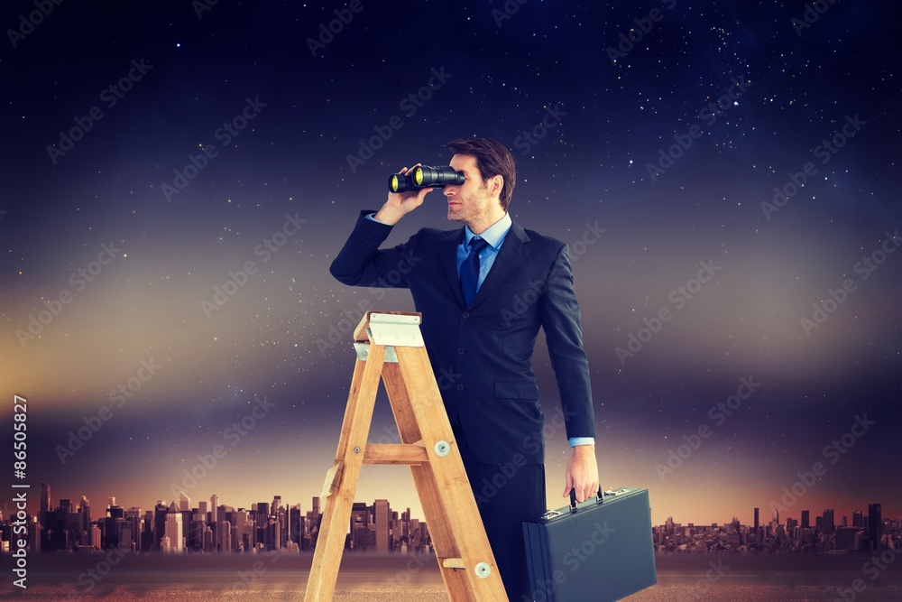 Composite image of businessman looking on a ladder