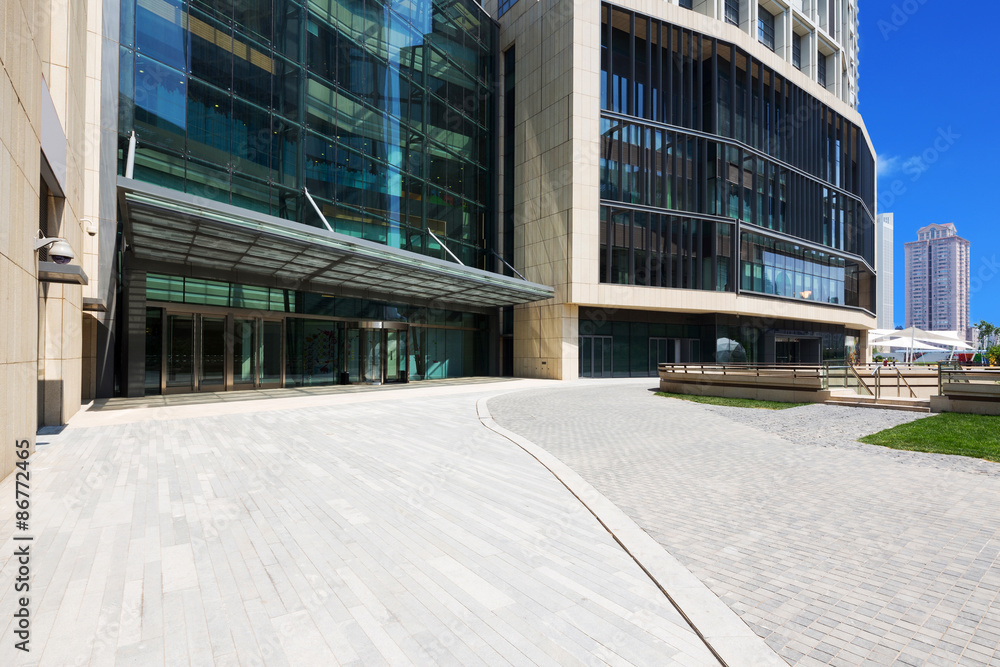 modern building exterior with brick road floor