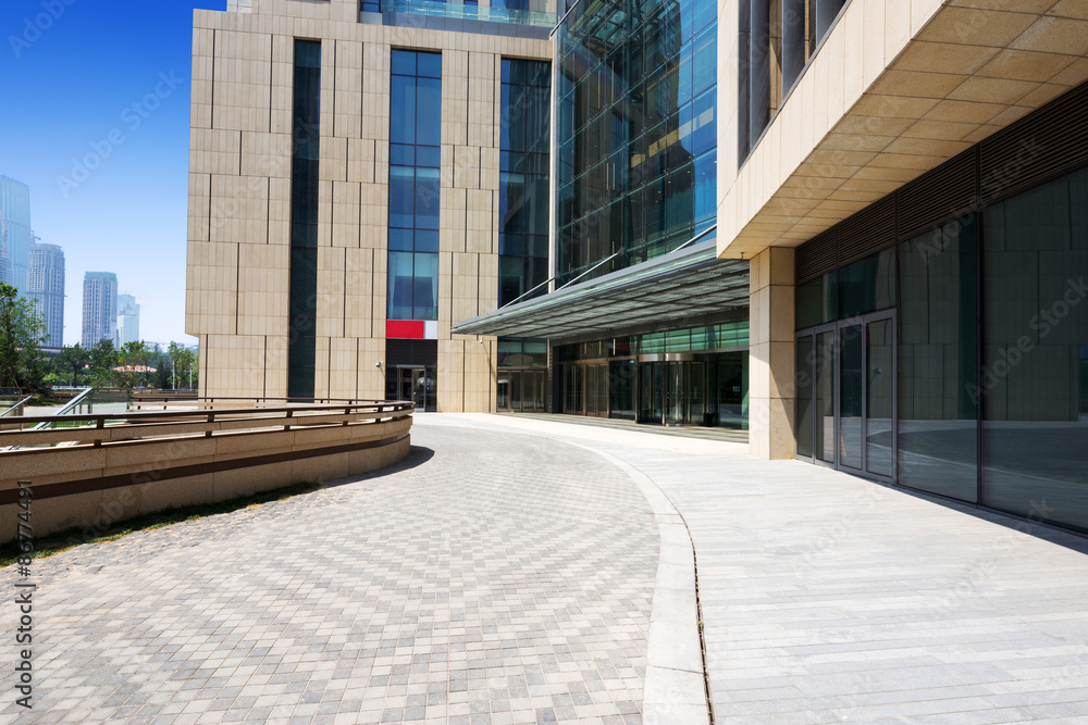 modern building exterior with brick road floor