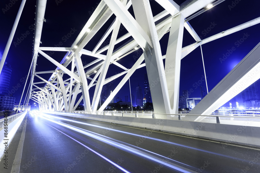 modern bridge with empty road floor at night