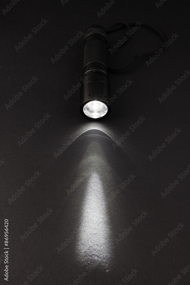 LED flashlight with a light beam