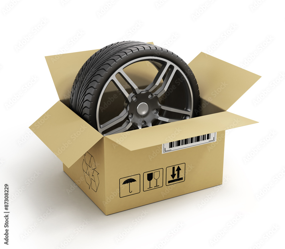 Open Cardboard Box with Tires on white background. Online store