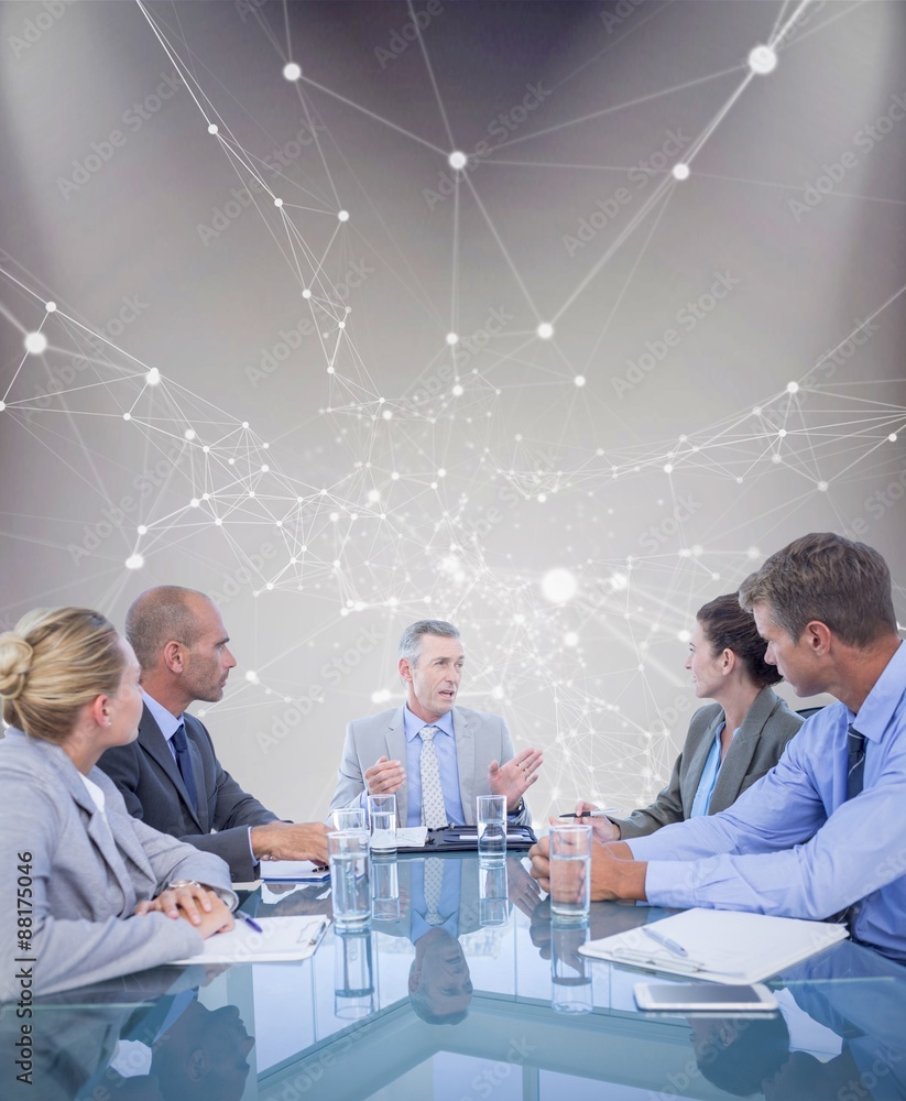 Composite image of business colleagues discussing about work