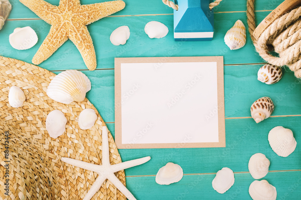 Blank message card with sea shells and straw hat