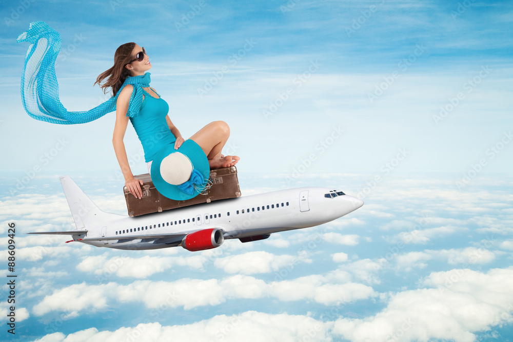 Young woman sitting on airplane