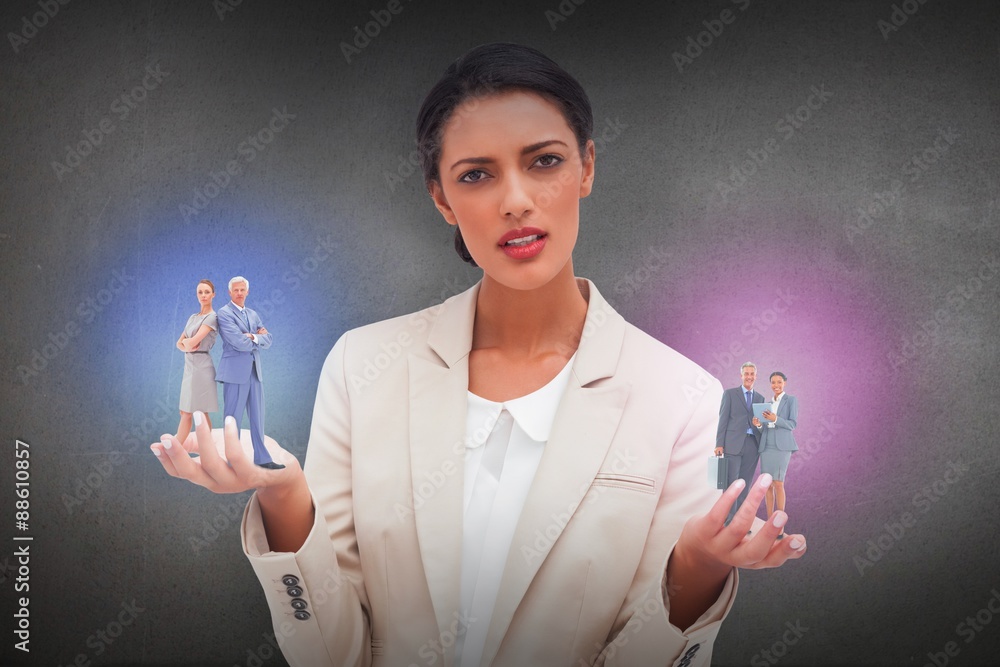 Composite image of businesswoman with hands outstretched