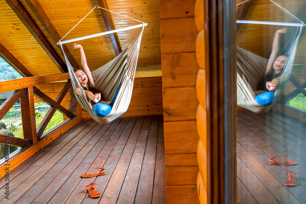 Woman resting in hammock