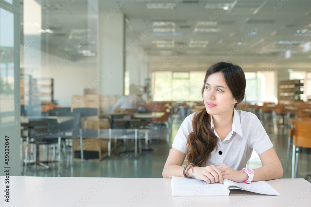 Asian student wondering or thinking about something