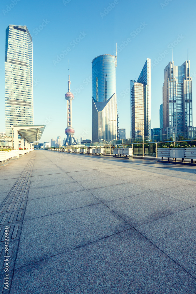 Empty road in front of the modern architecture，in Shanghai, China