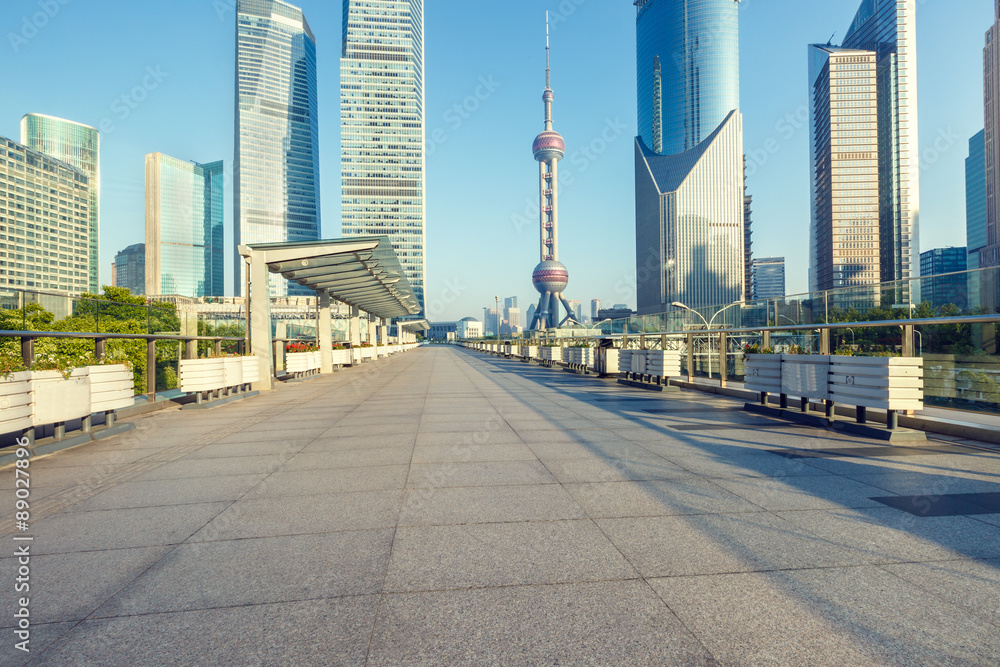 Empty road in front of the modern architecture，in Shanghai, China