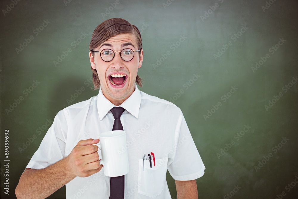 Composite image of geeky businessman holding a mug 