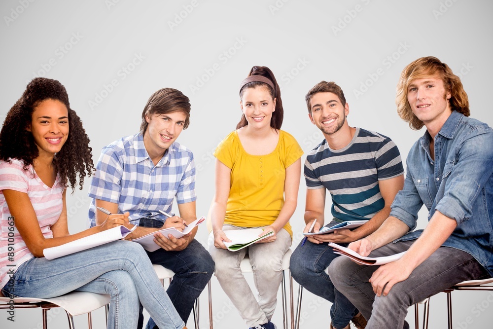 Composite image of college students doing homework