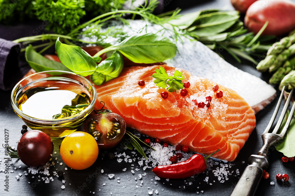 Delicious  portion of  fresh salmon fillet  with aromatic herbs,