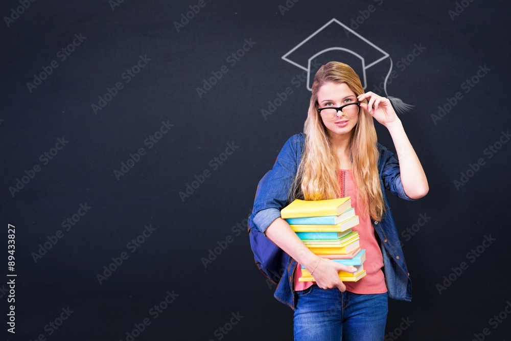 Composite image of pretty student in the library