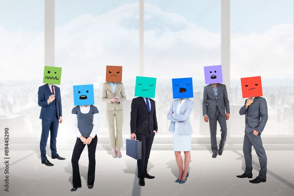 Composite image of people with boxes on their heads