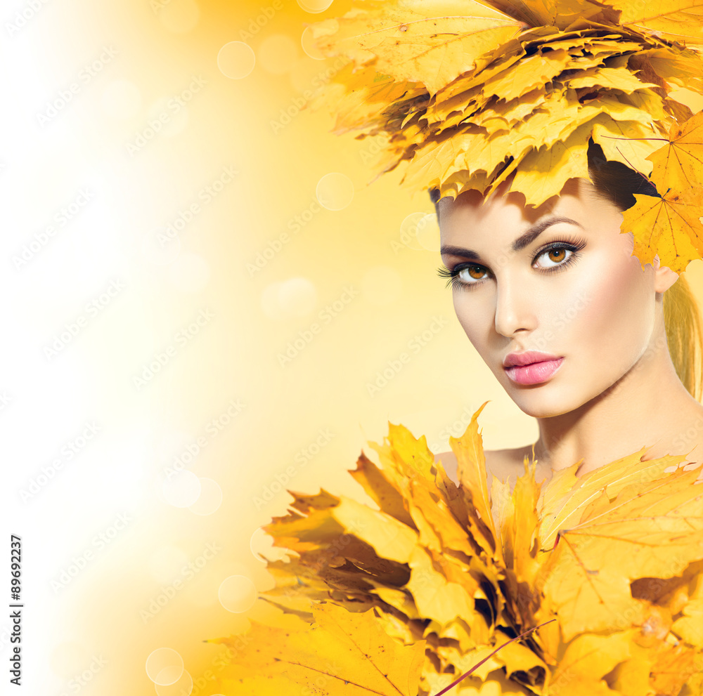 Autumn woman with yellow leaves hair style