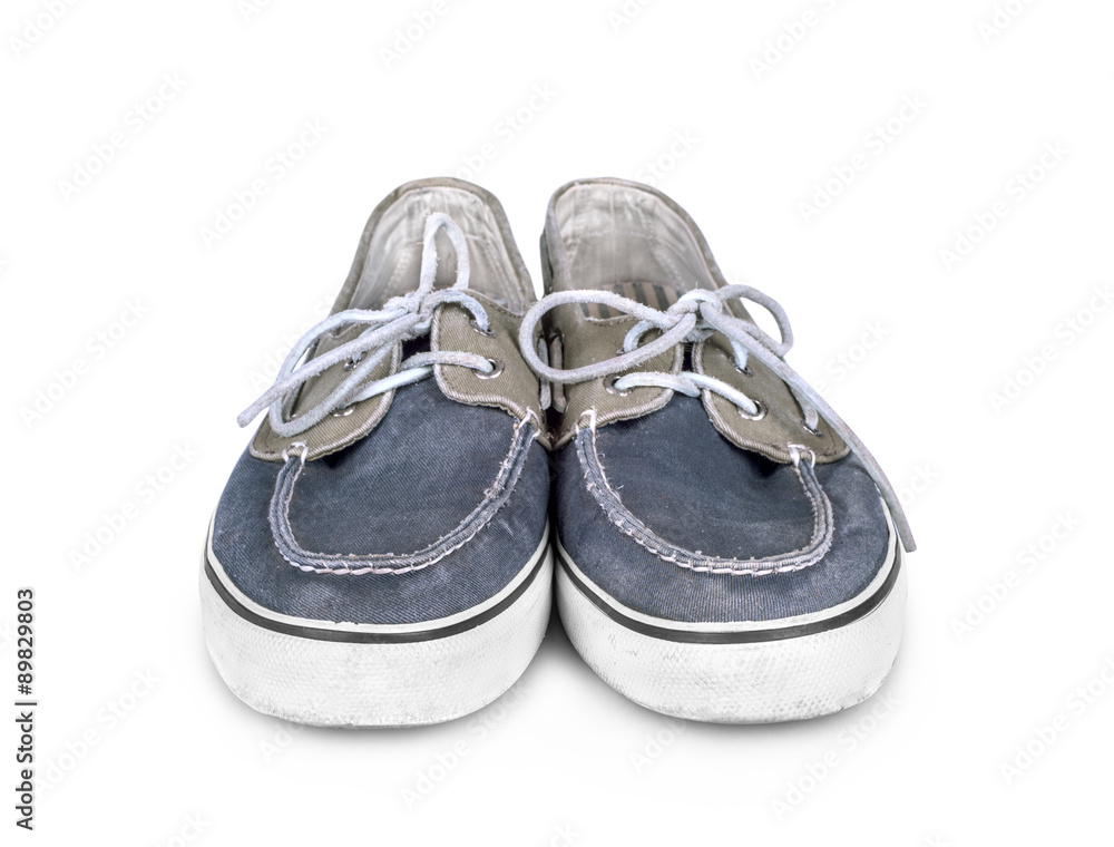 Sneakers isolated on white background shadow below.