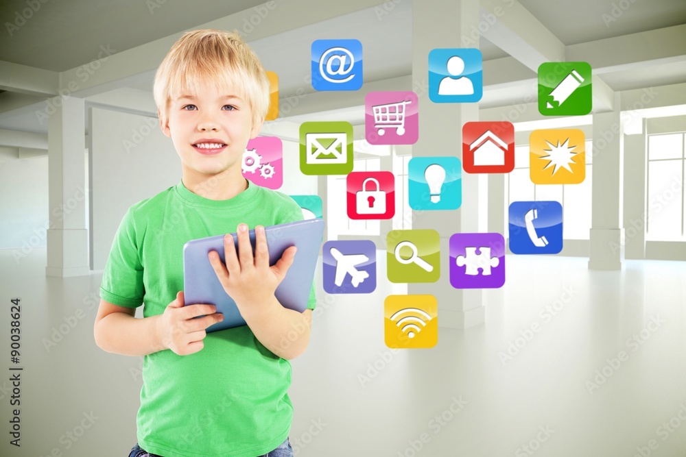 Composite image of cute boy using tablet