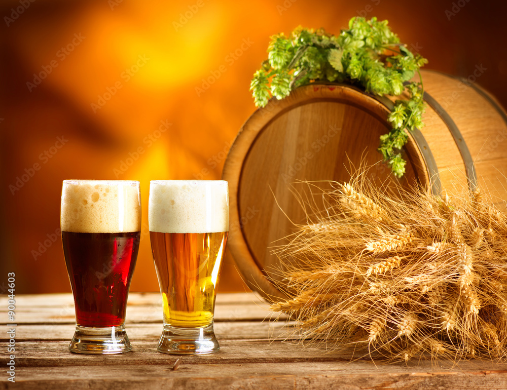 Vintage beer barrel and two glasses. Beer production. Brewery