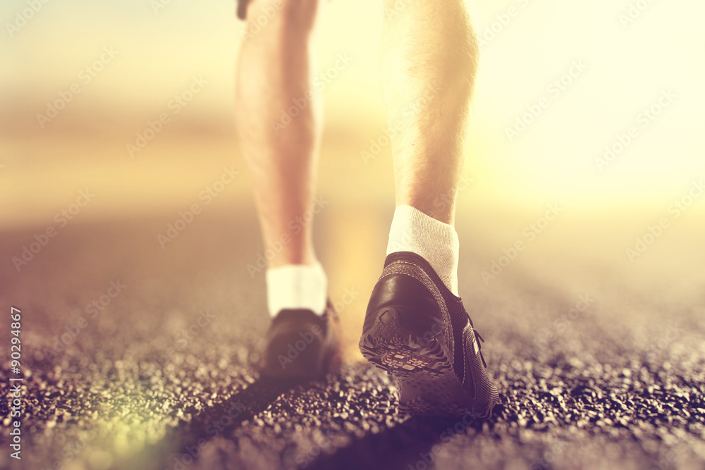 Man feet in socks and sneackers outdoor