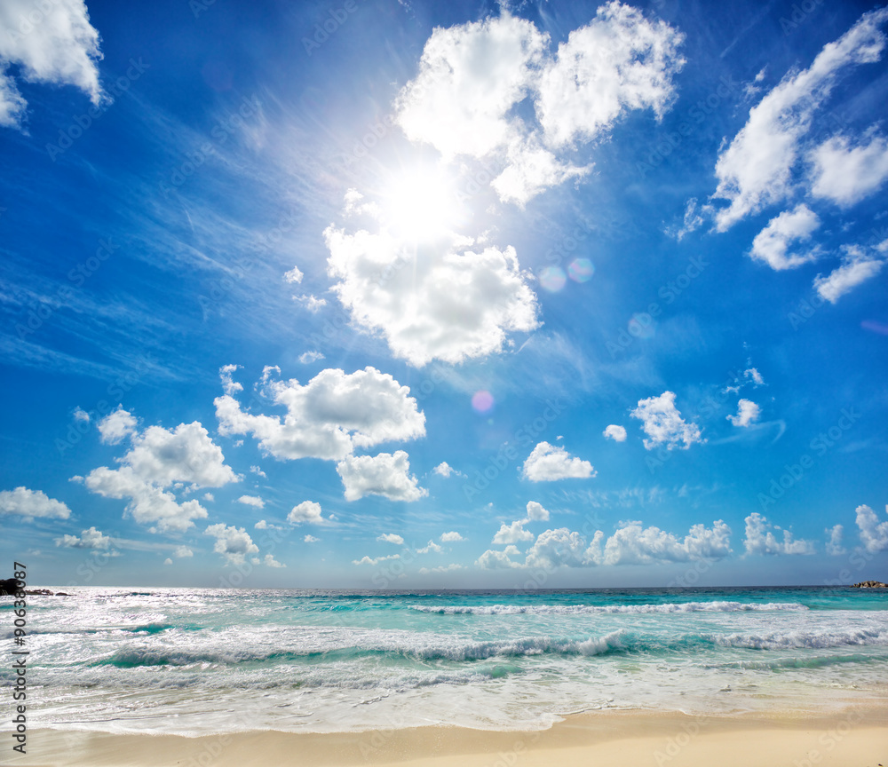 Waves at Grande Anse beach in La Digue Island, Seyshelles