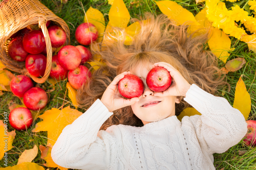 Child in autumn park