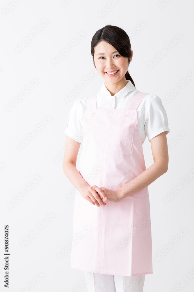 young asian care worker isolated on white background