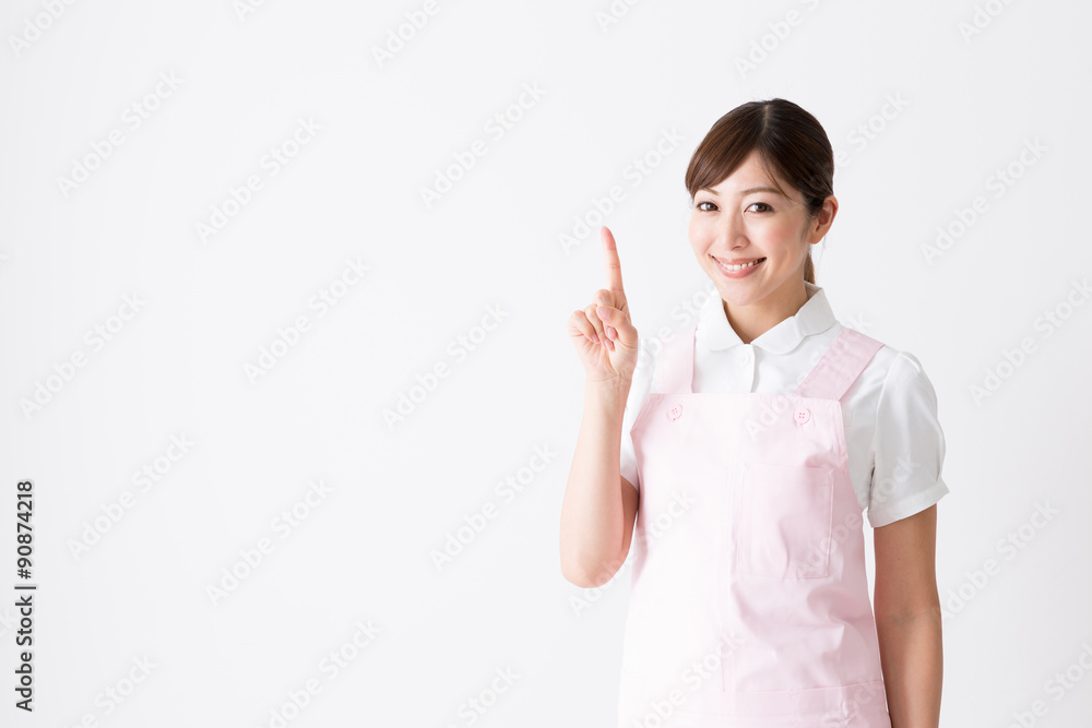 young asian care worker isolated on white background