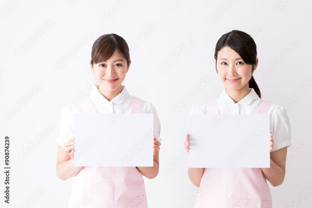 young asian care worker isolated on white background