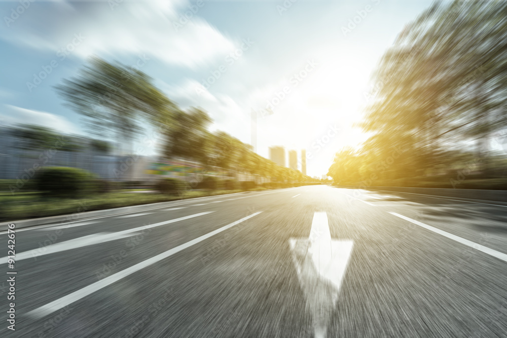 empty asphalt road under sunshine