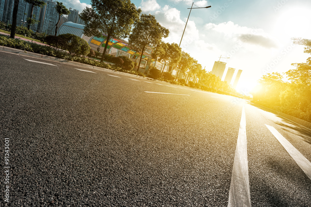 empty asphalt road under sunshine