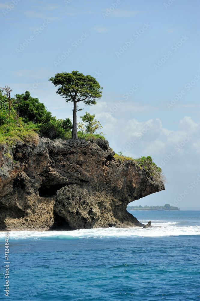 Blue sea and white cloud with green island