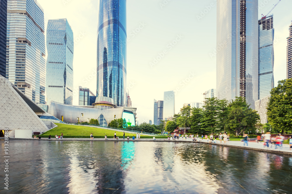 skyscrapers and museum along the waterside