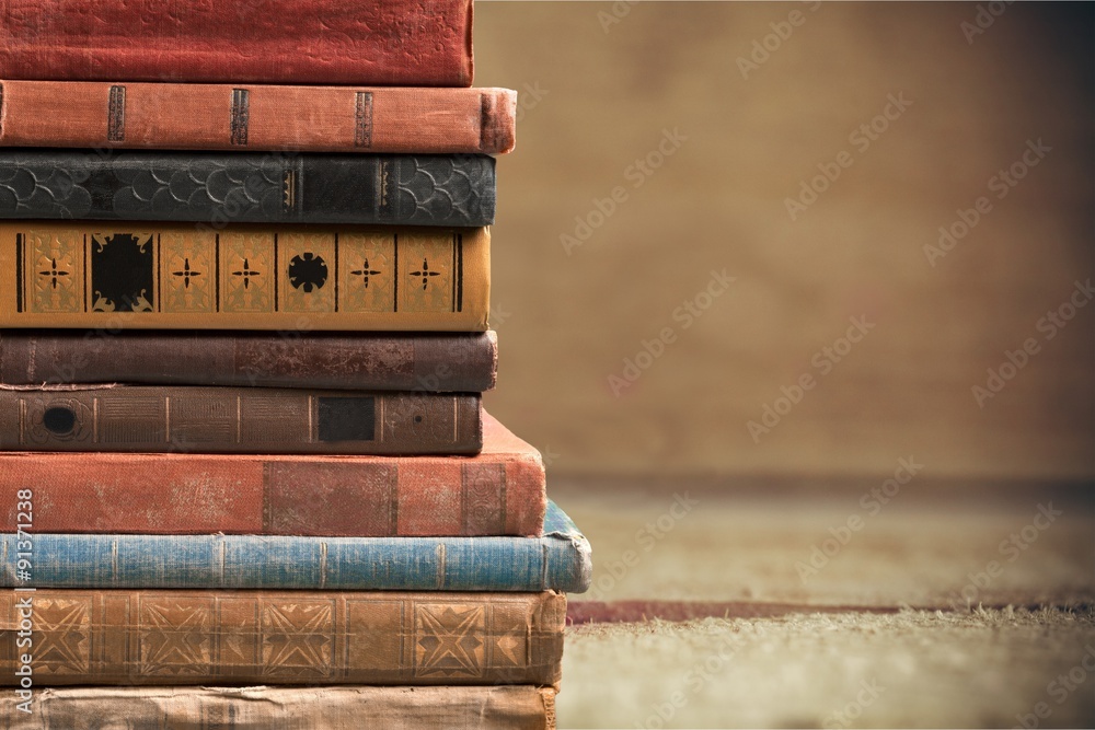 Stacked old books.