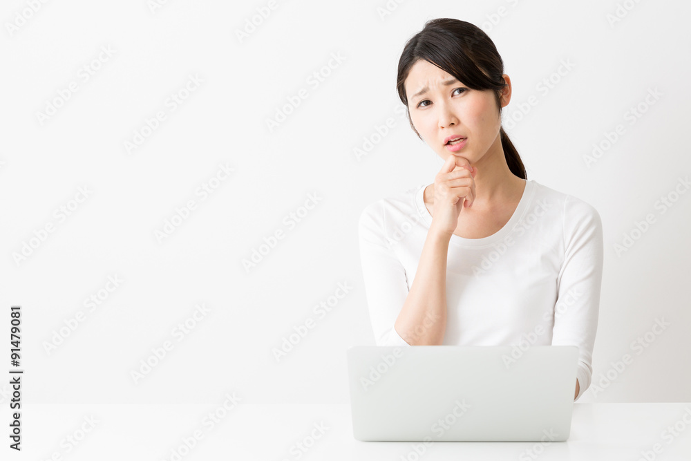 attractive asian woman using laptop