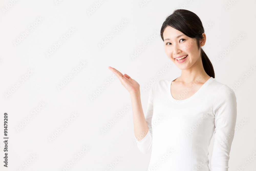 portrait of attractive asian woman on white background