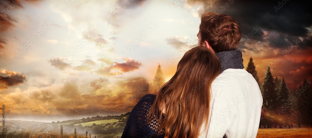 Composite image of close up rear view of romantic couple