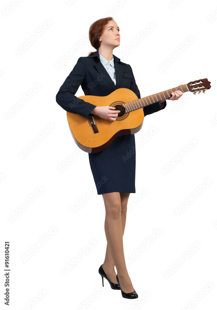 Businesswoman with guitar