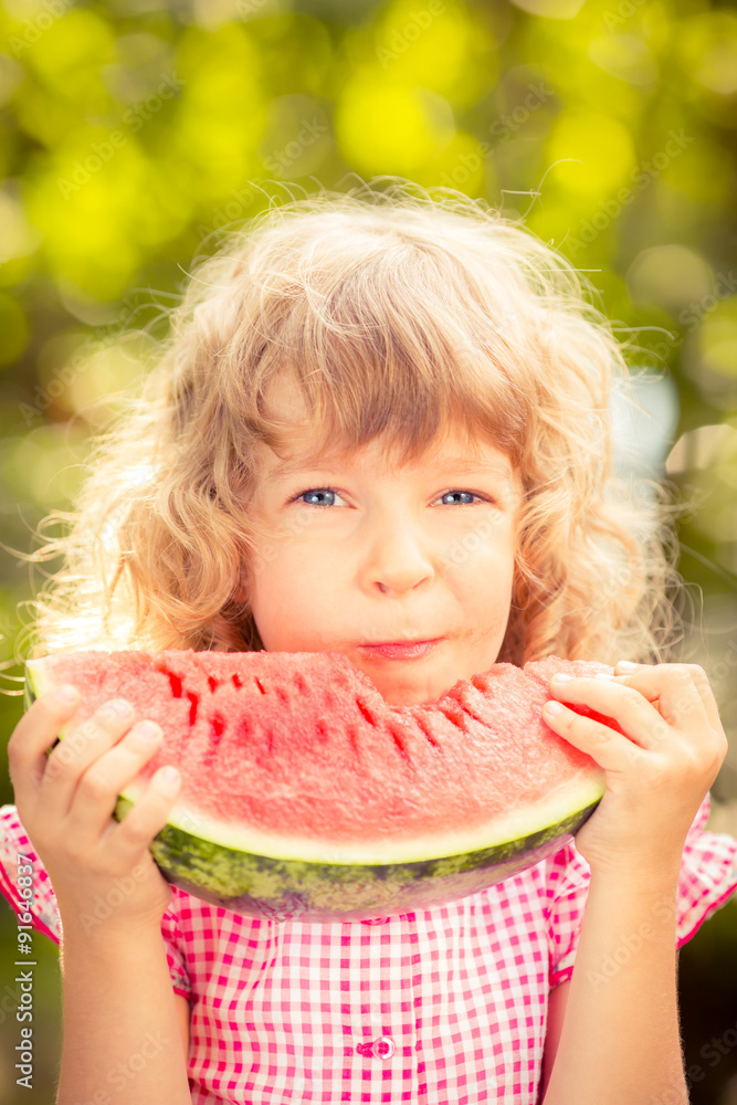 Child eating watermelon